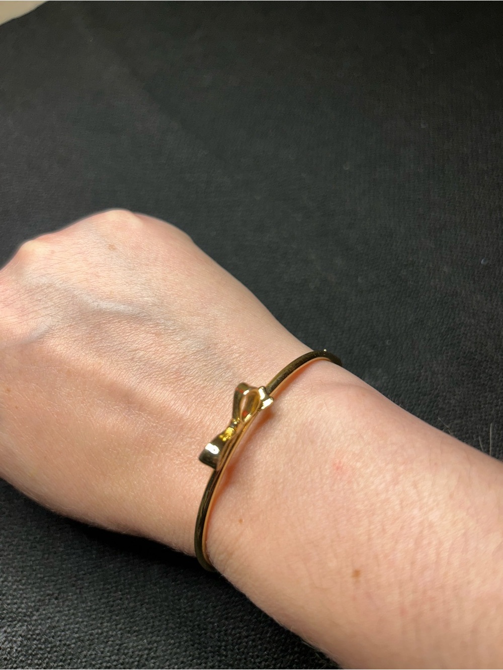 Kate Spade Gold‑Tone Bow Hinge Bangle Bracelet – Classic & Feminine